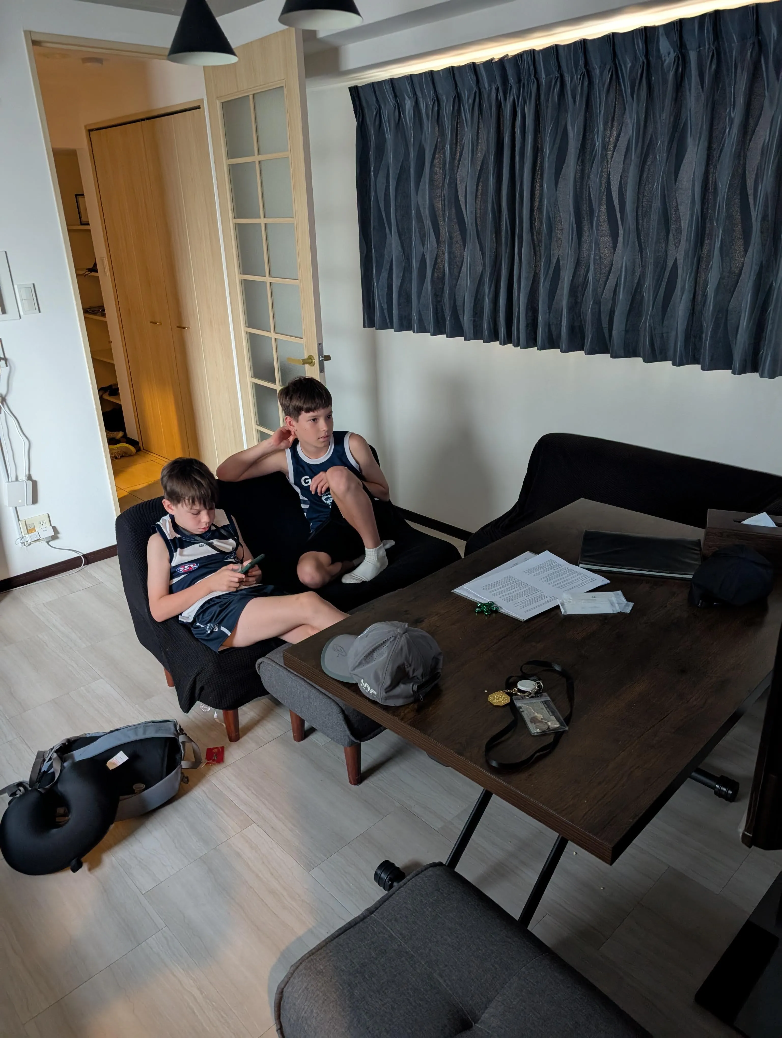 The boys relaxing in the living area of our Osaka apartment