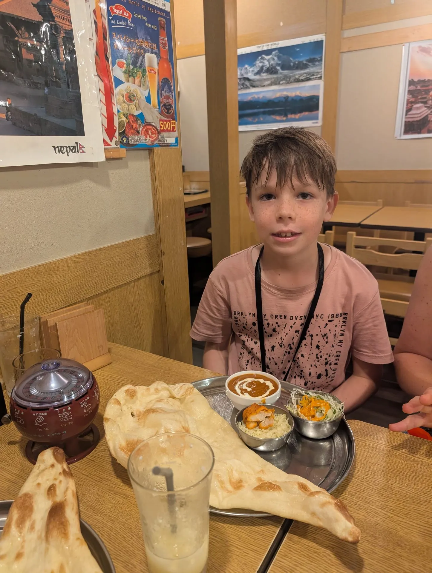 A child with naan and mild curry at an Indian restaurant in Hakone