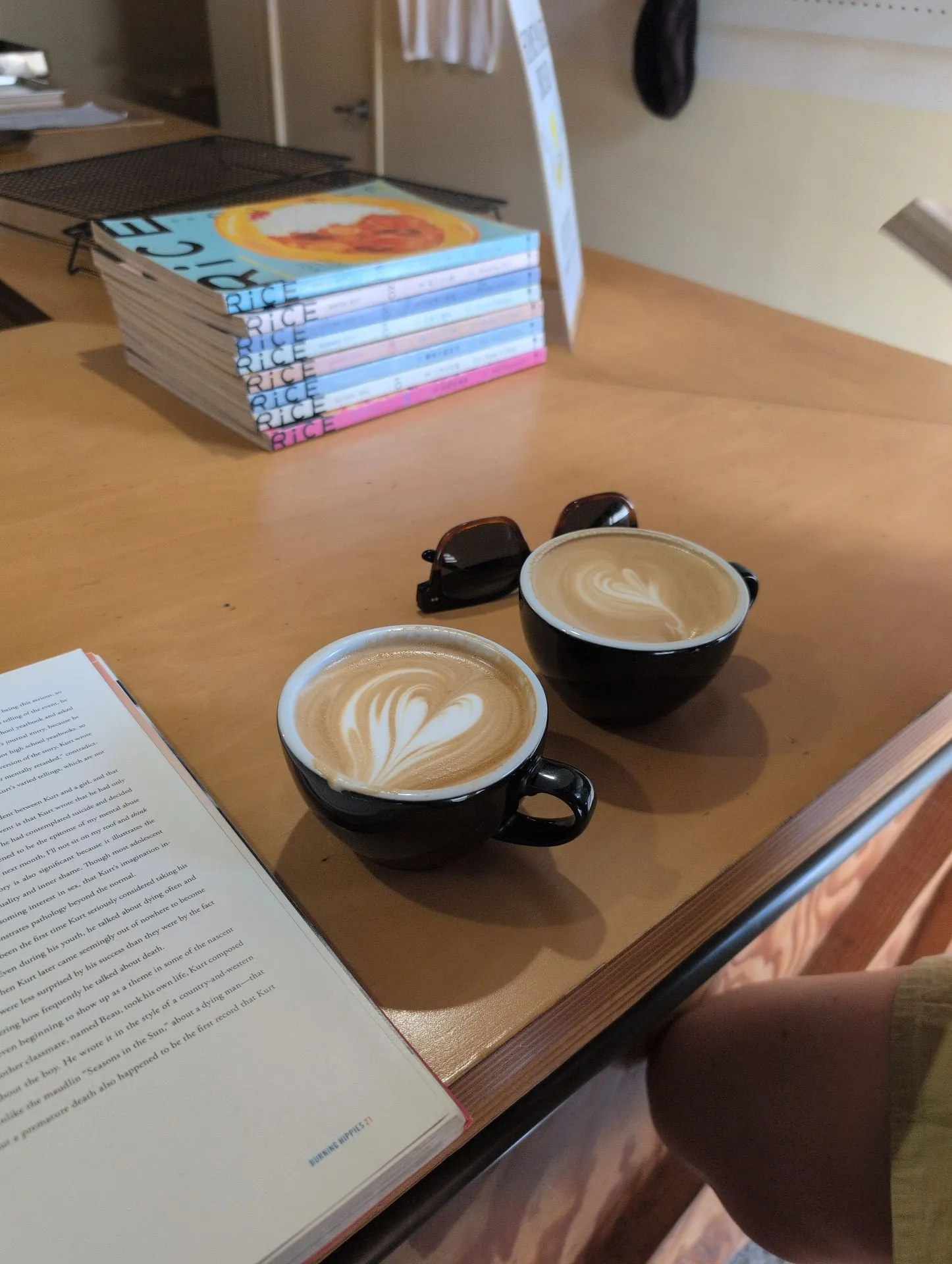 A latte with latte art at a bookshop cafe in Kyoto