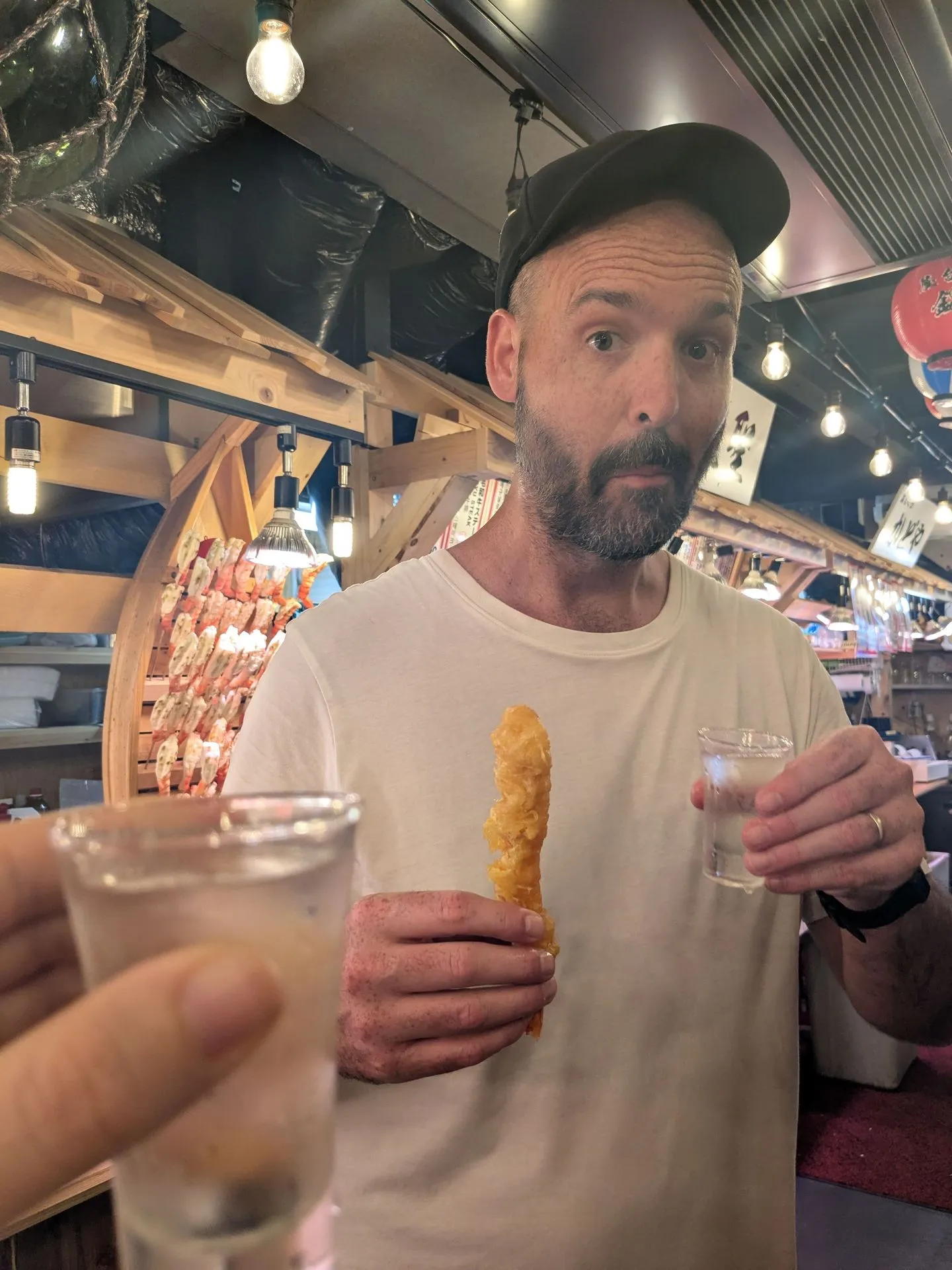 A prawn tempura skewer at Nishiki Market, Kyoto