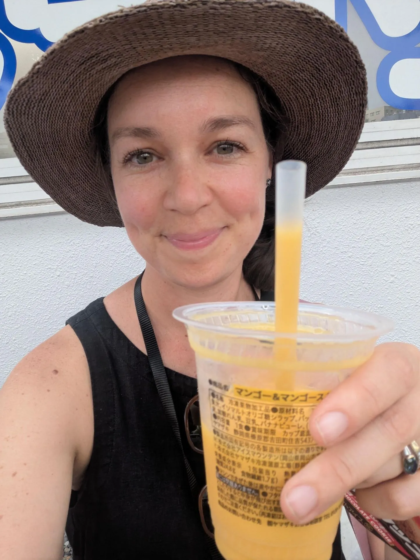 A mango smoothie street selfie in Shinjuku, Tokyo
