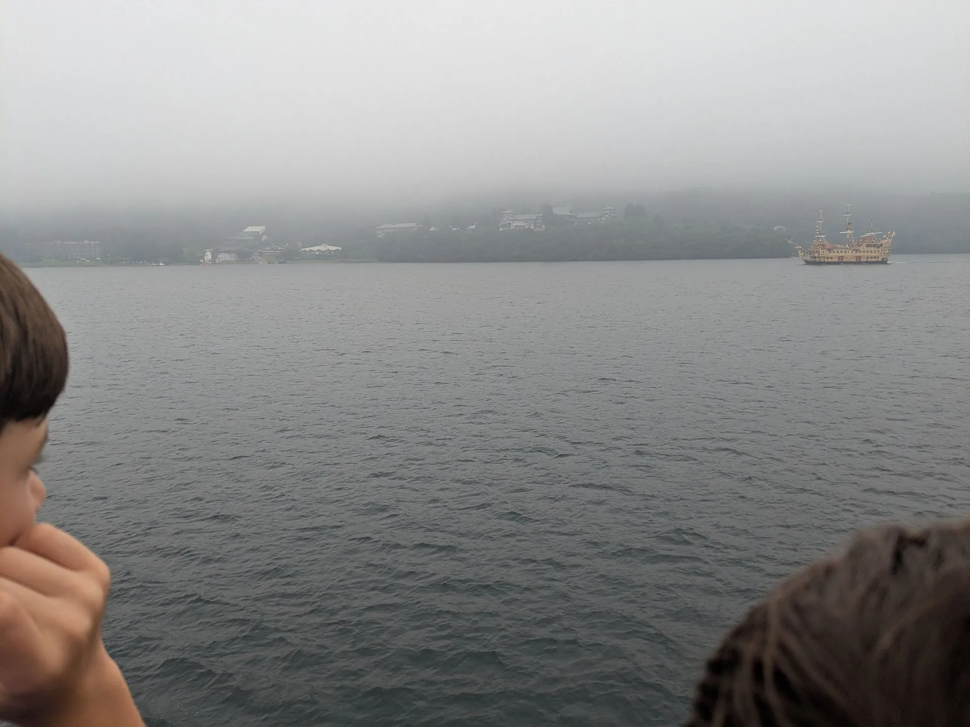 Misty view across Lake Ashi from the deck of the pirate ship