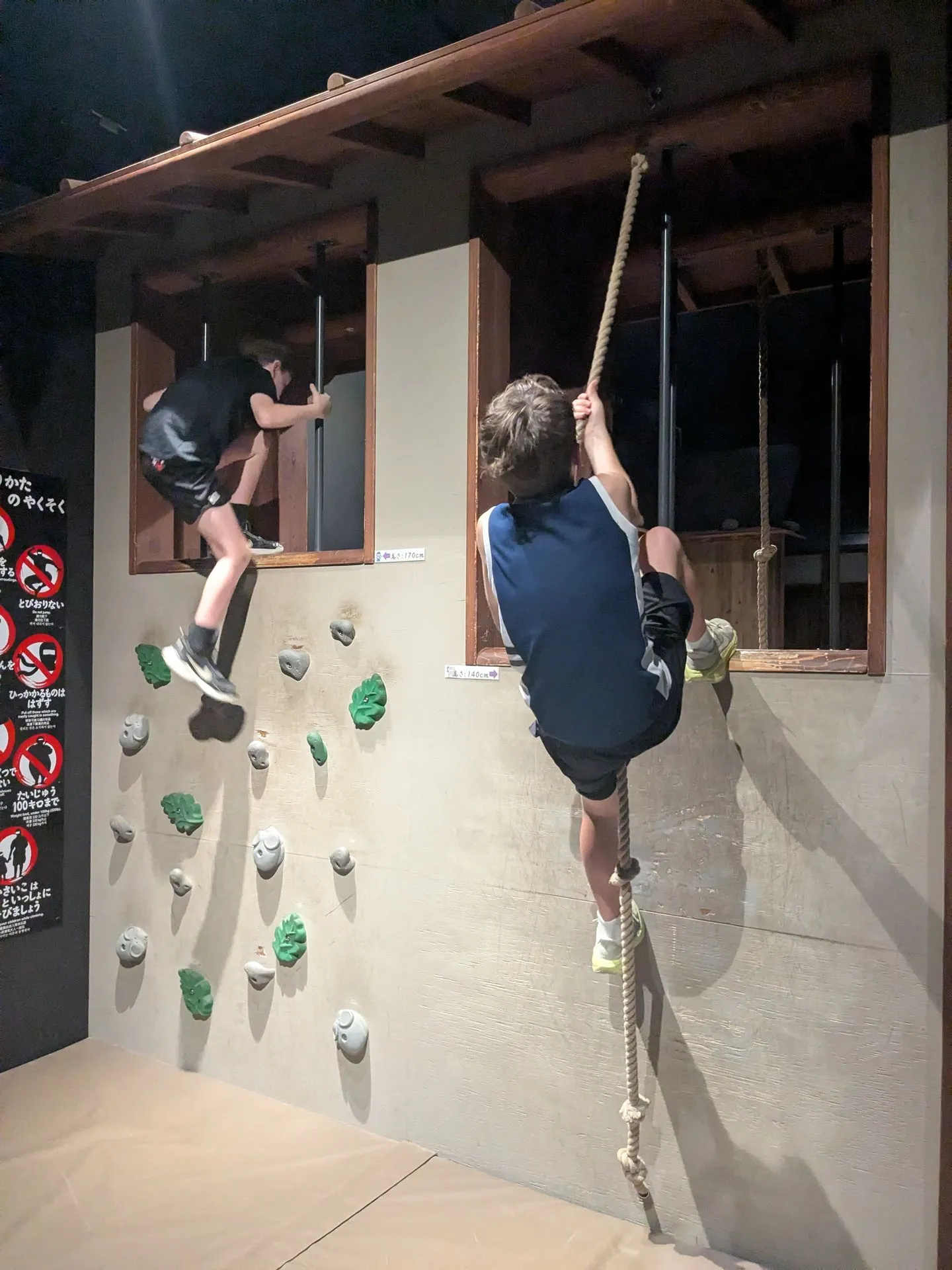 Kids on a climbing wall at the Odawara Ninja Museum