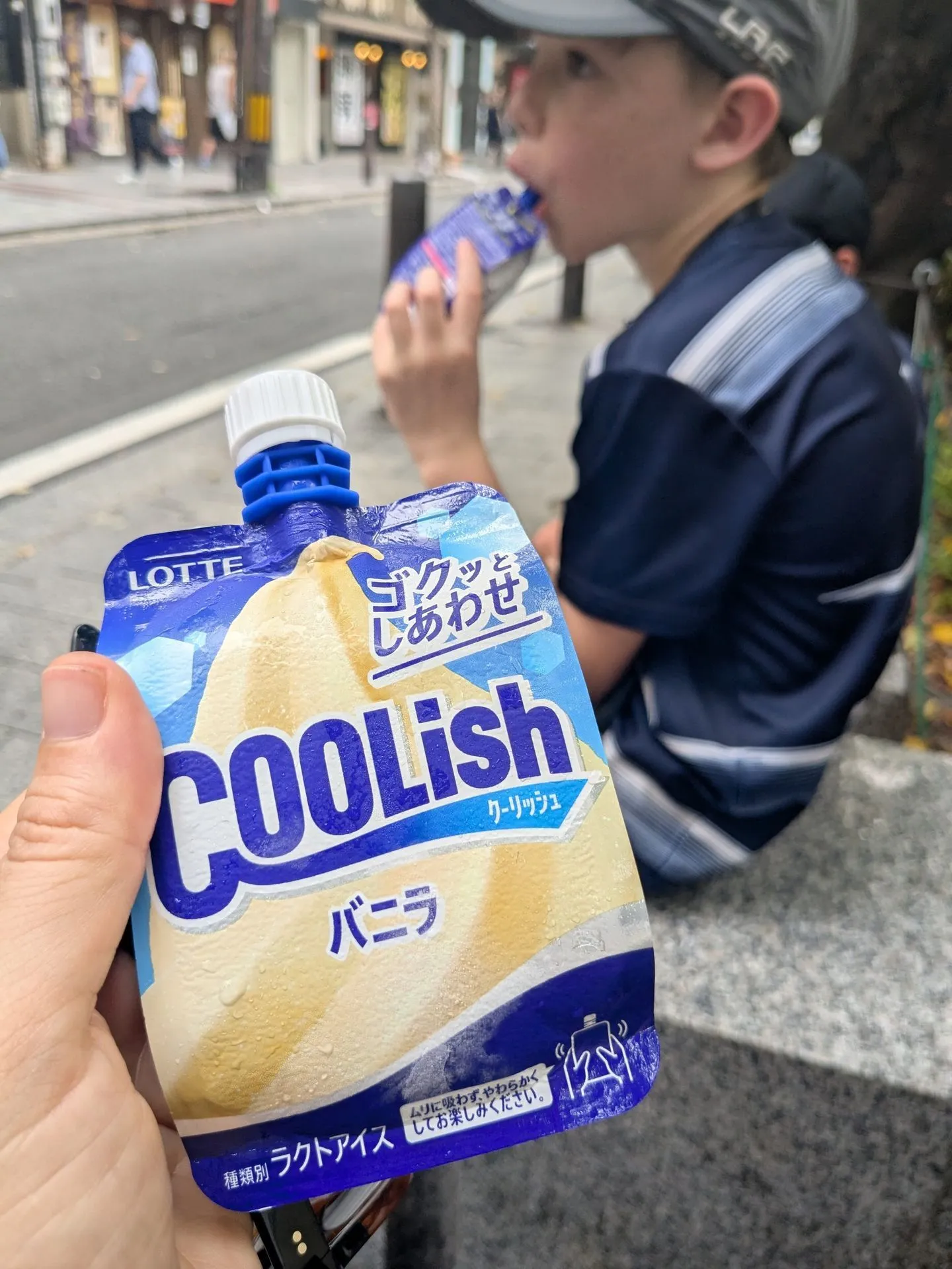 Coolish squeezable ice cream being held on a Kyoto street