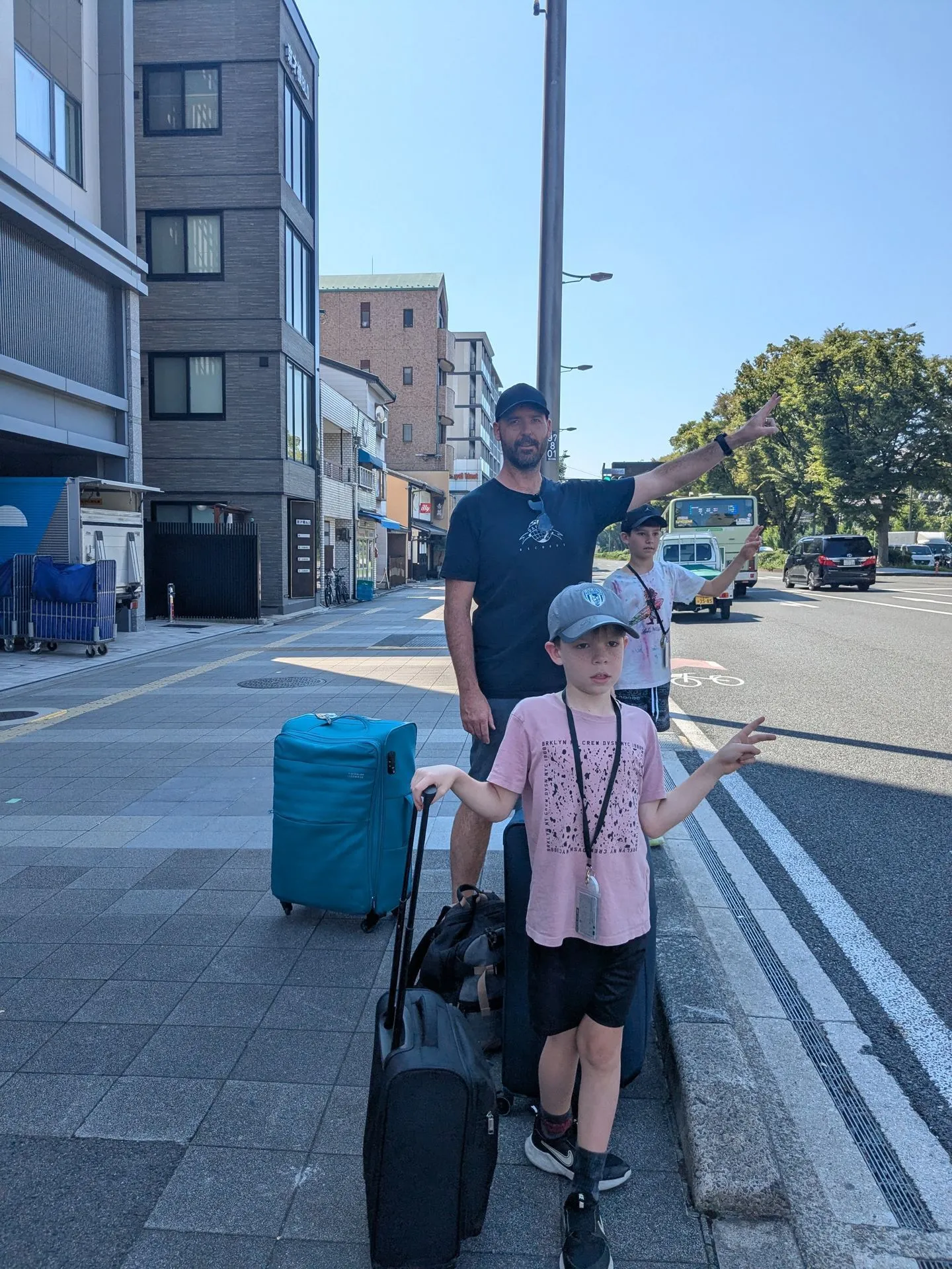 Suitcases on a Kyoto street on the morning we moved on to the next city