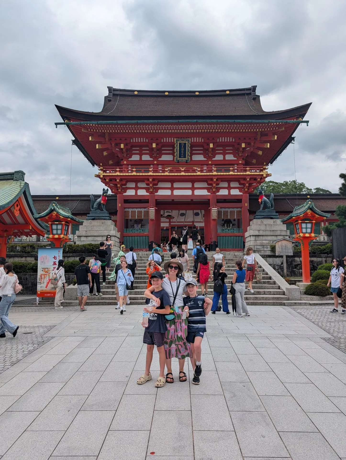 Lyndsie and our two boys in front of the Romon Gate at Fushimi Inari Taisha shrine in Kyoto