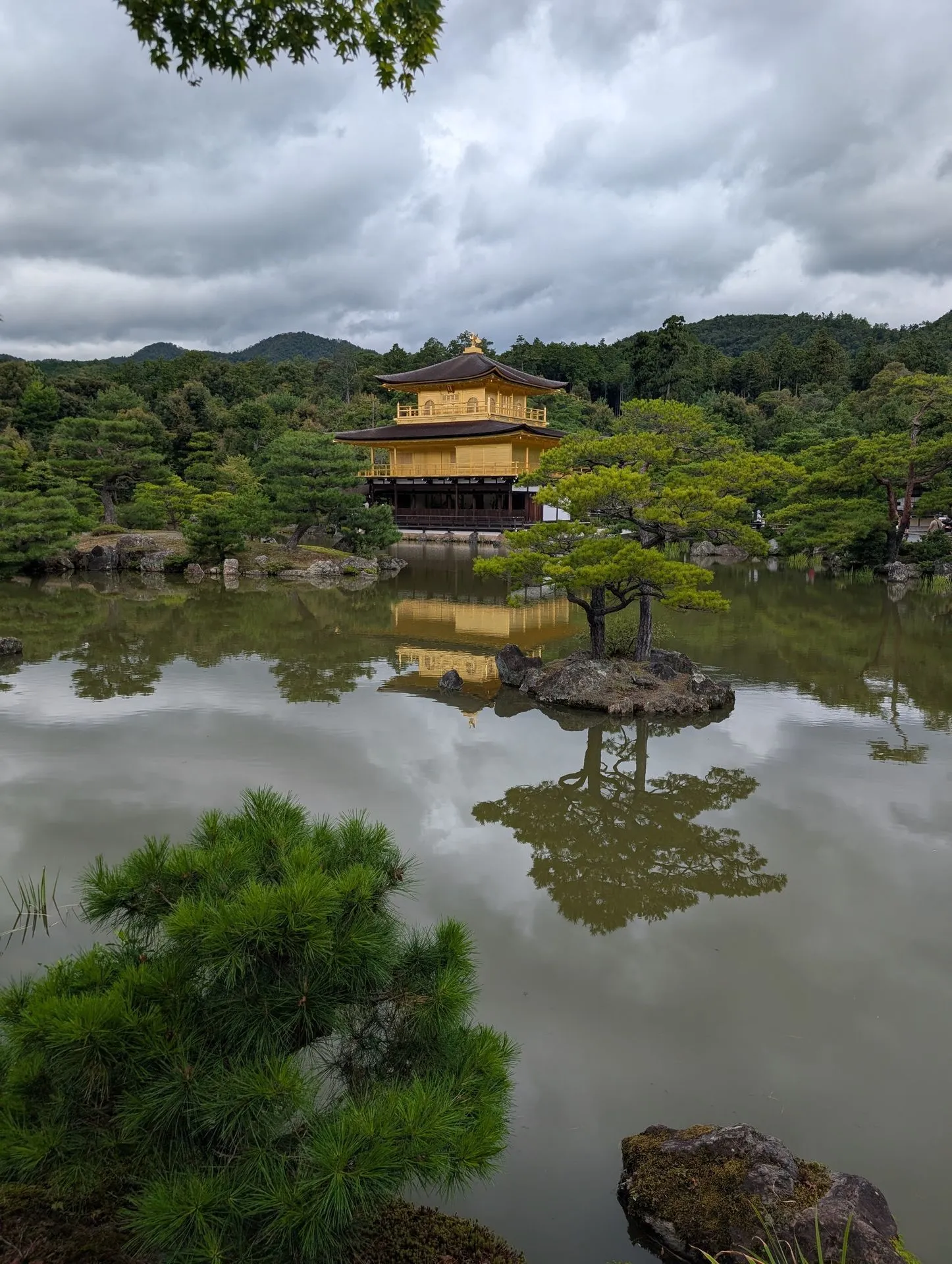 The Golden Pavilion at Kinkakuji reflected perfectly in the mirror pond