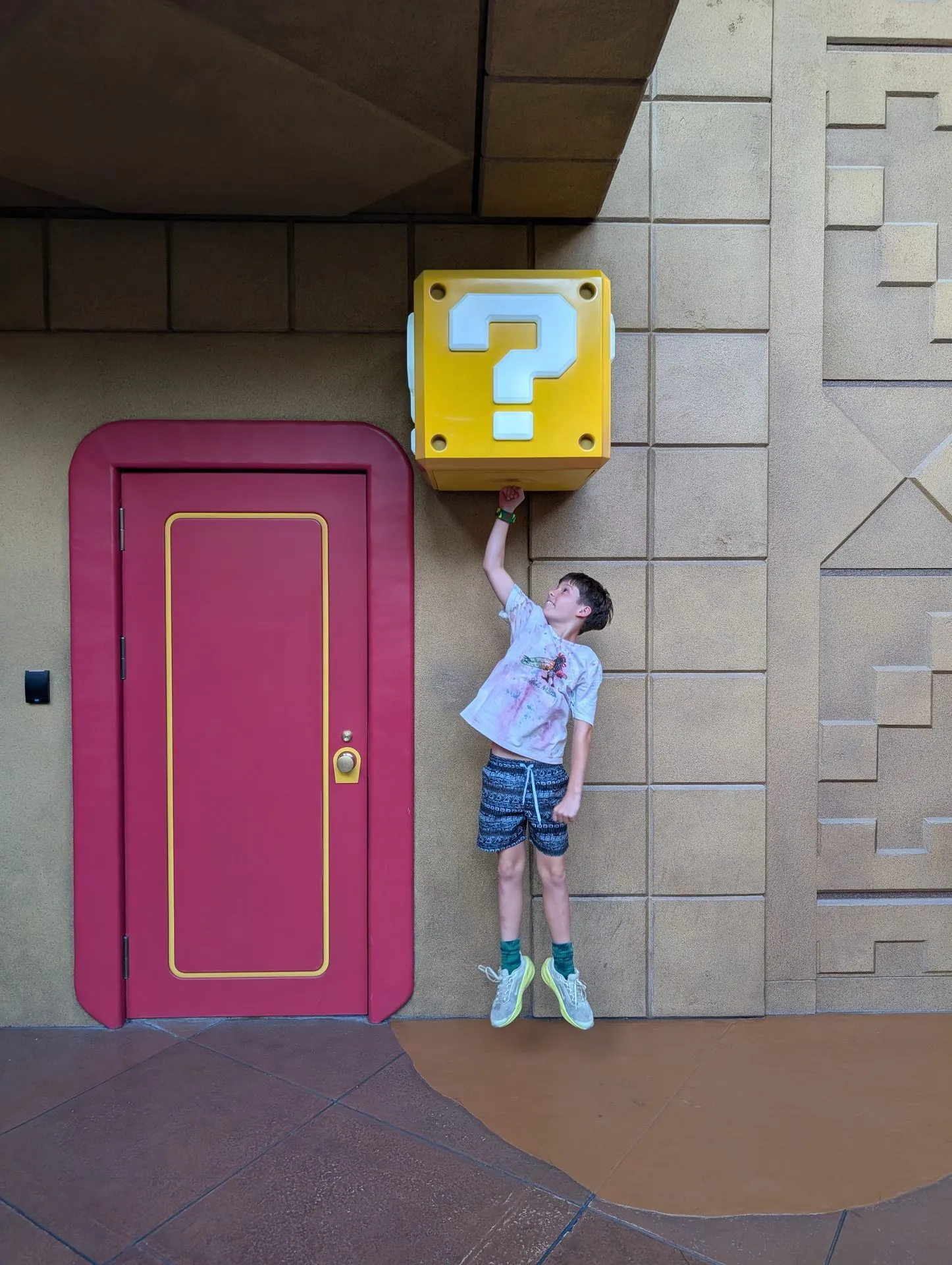 A Super Nintendo World question block ready to be punched by a Power-Up Band