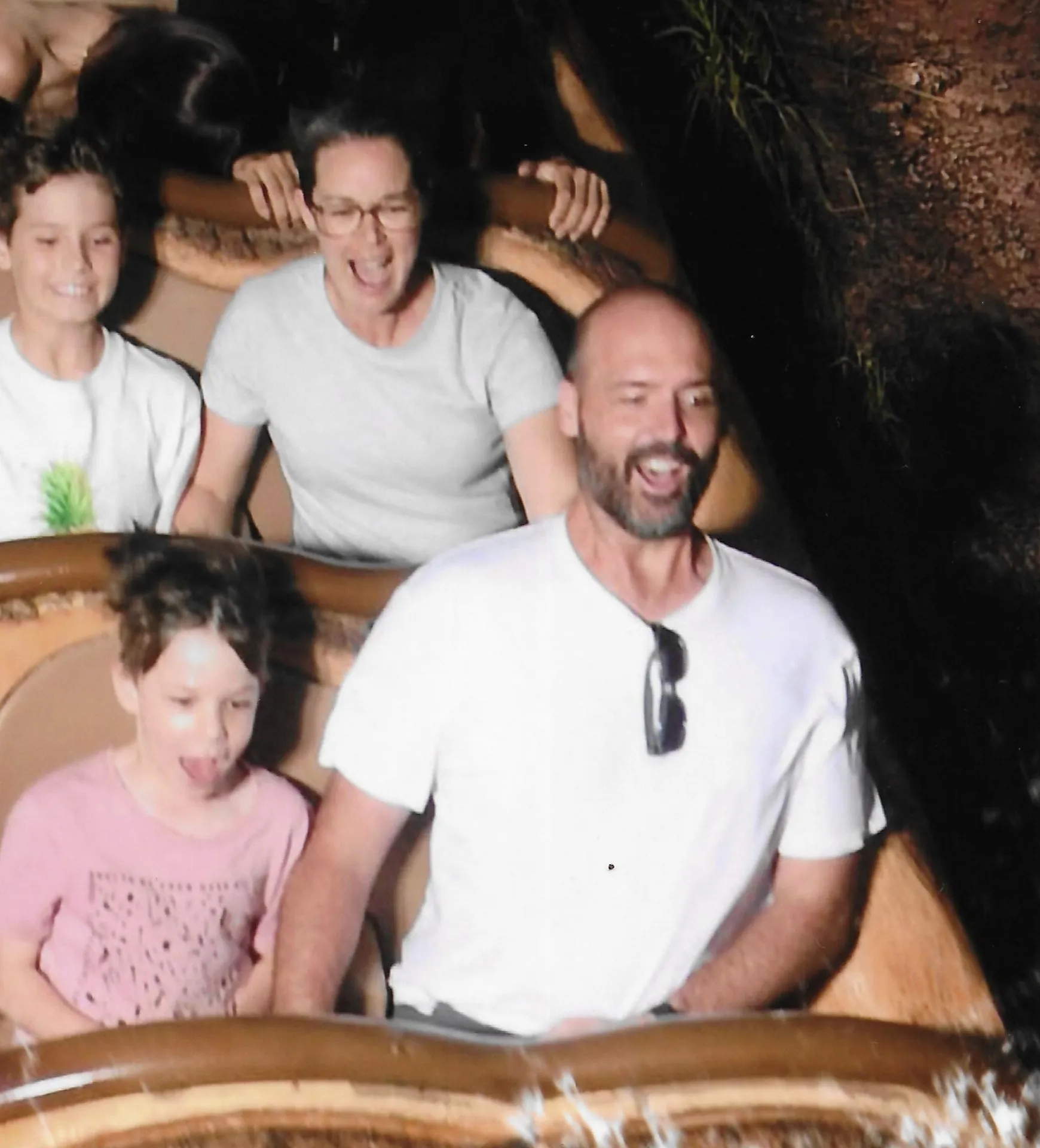 Family on the final drop of Splash Mountain at Tokyo Disneyland, caught by the on-ride camera