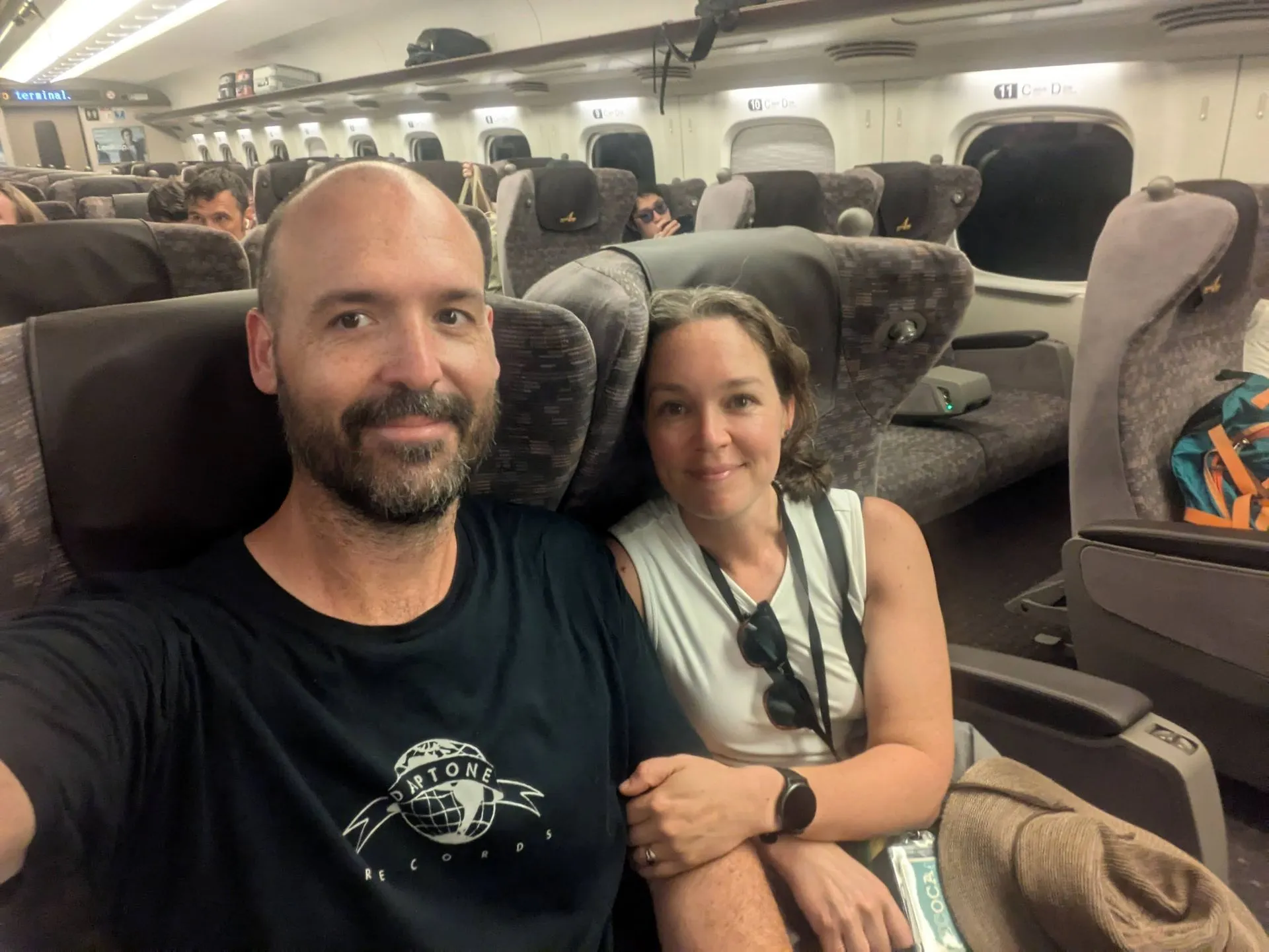 Matt and Lyndsie taking a selfie in their Shinkansen seats from Kyoto to Tokyo